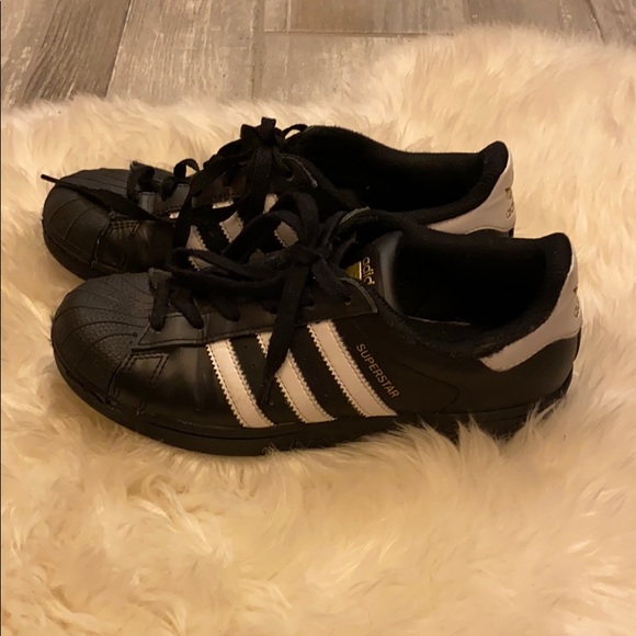 adidas shoes with adidas written on the side